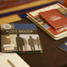 Several different pamphlets and books on a table