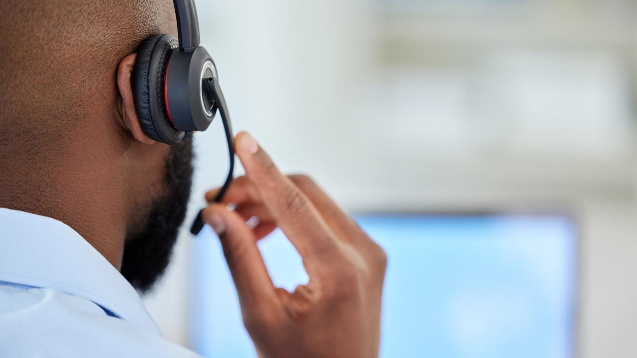 A person taking an important phone call