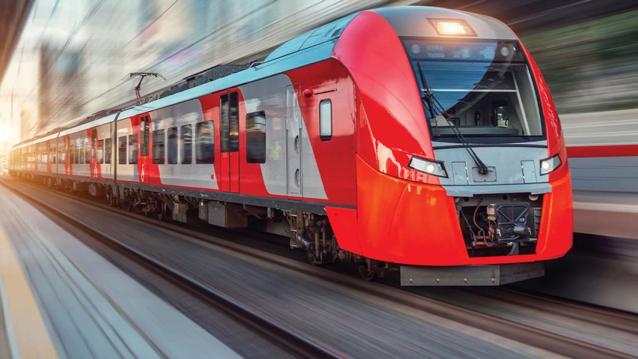 Electric passenger train driving at high speed