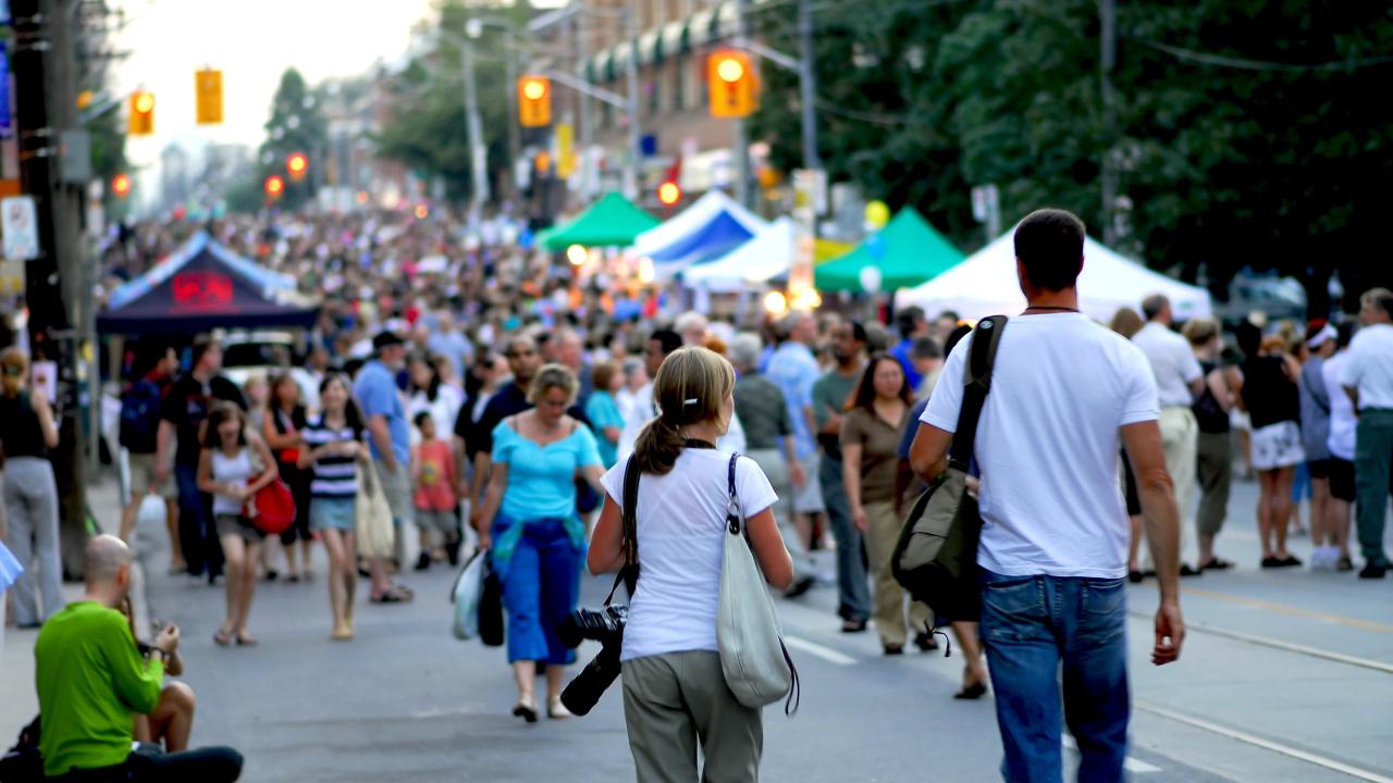 People walking in a street festival