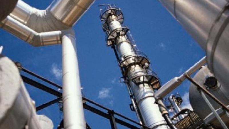 Pipes and smokestacks at a chemical facility.