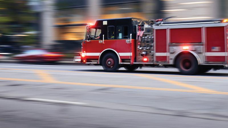Fire truck rushing to an emergency in the city