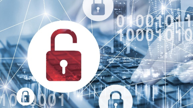 Image of opened Padlock, with a typing hand on a keyboard on the background. 
