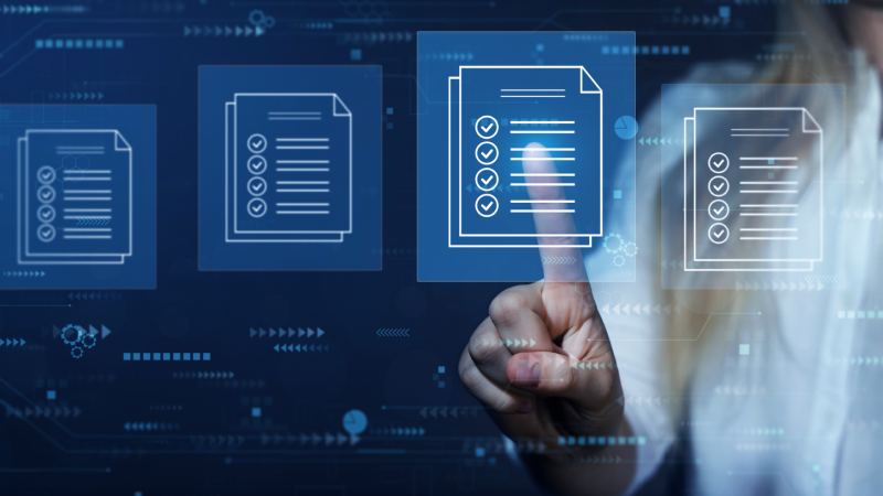 Futuristic interface with woman selecting a document.
