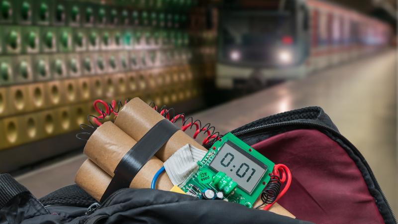 An image of a bomb about to go off with a train coming