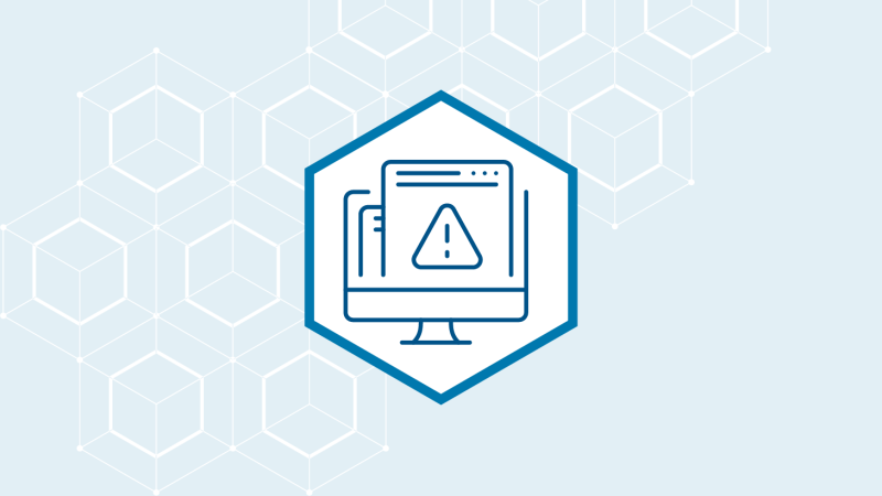 Computer monitor with warning sign icon on a light blue background