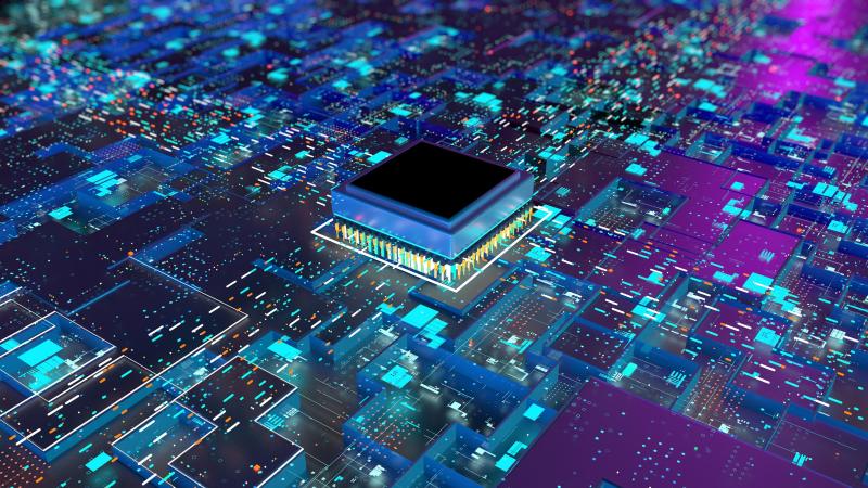 Magenta and blue circuit board with central chip as the focus