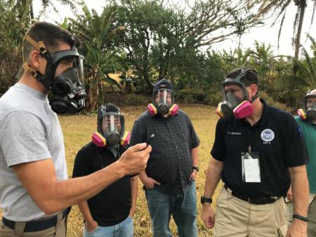 ECC Lawless and government partners wearing gas masks during an exercise