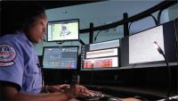 Dispatcher at a computer console.