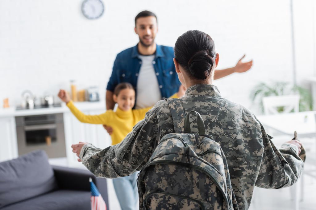 Female military veteran returning to husband and child.