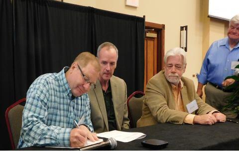 From left to right: Bob Symons, Wyoming SWIC, Ron Hewitt, Director, Office of Emergency Communications, Chris Lewis, Department of the Interior, and Jim Downes, Office of Emergency Communications