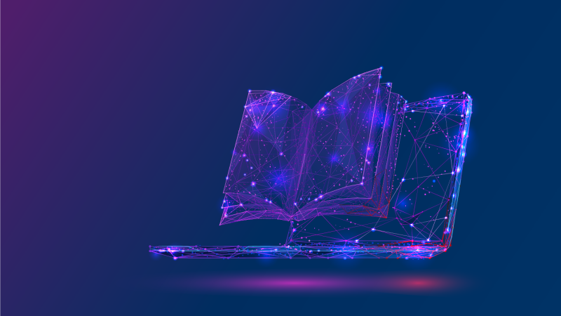 Futuristic laptop with book floating in front of screen.
